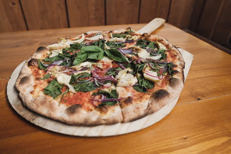 Veggie Supreme pizza loaded with fresh vegetables