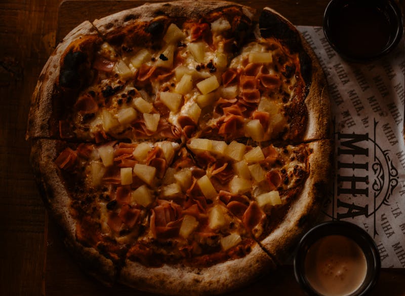 Hawaiian pizza with ham and pineapple